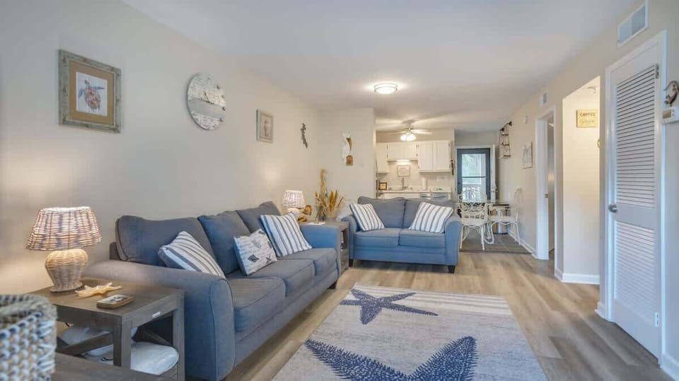 Updated seating area is perfect for relaxing after a day on the beach!