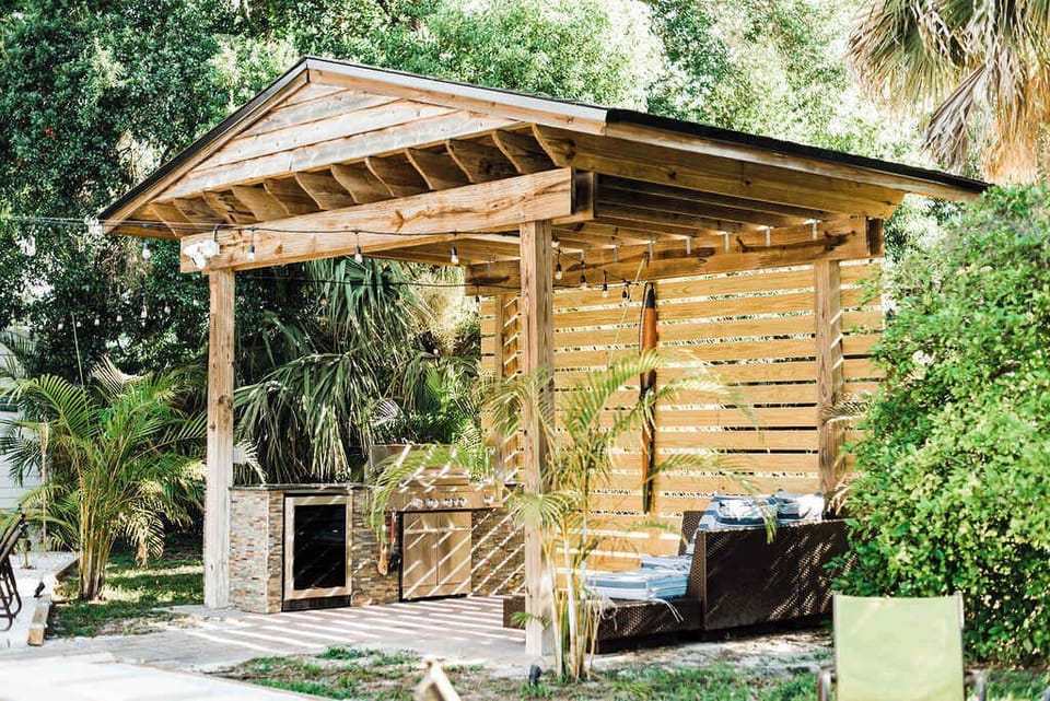Grill up your favorites in the outdoor kitchen and keep your drinks cool in the nearby fridge—this patio space is made for relaxing afternoons and casual gatherings.