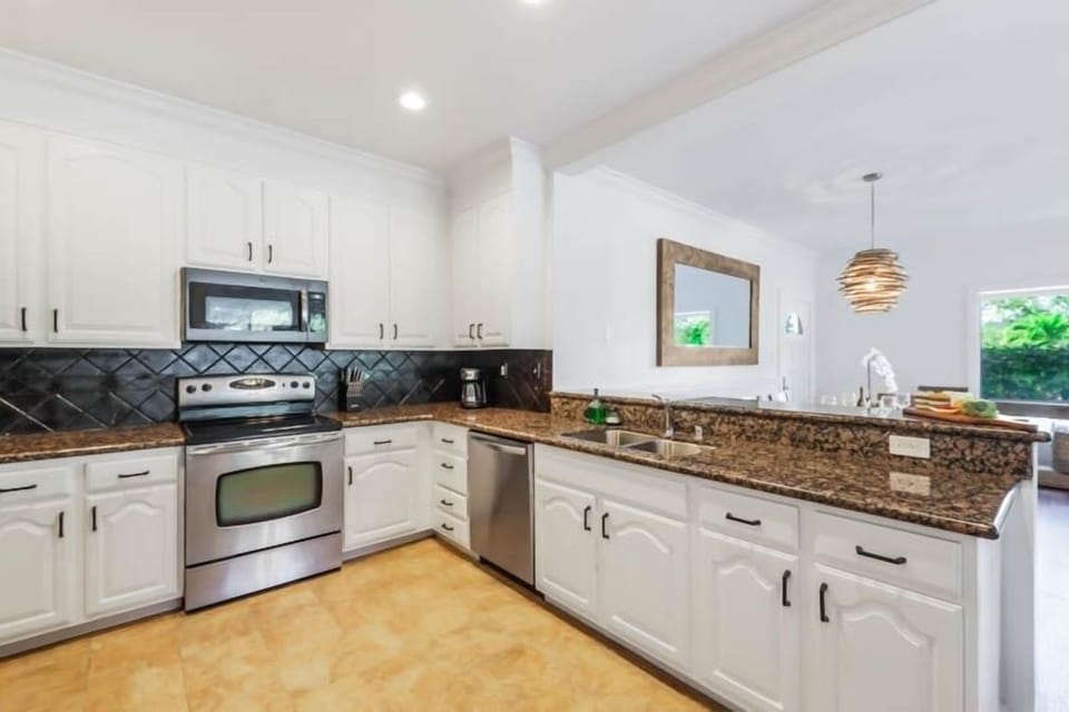 Condo, 2 Bedrooms | Private kitchen | Coffee/tea maker, fridge, oven, stovetop
