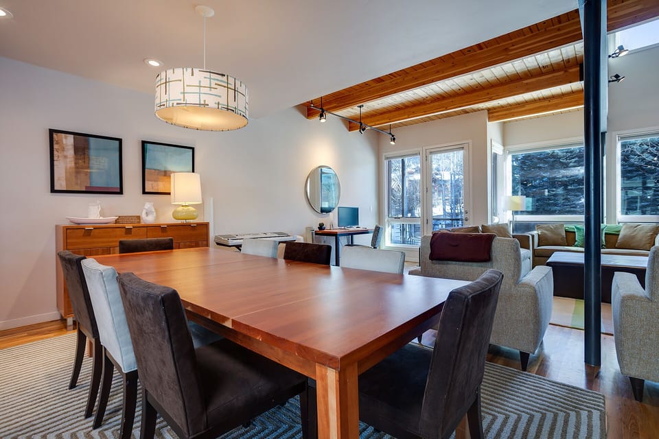 Gather around your beautiful dining table for memorable meals, with the living area just steps away for post-dinner relaxation.