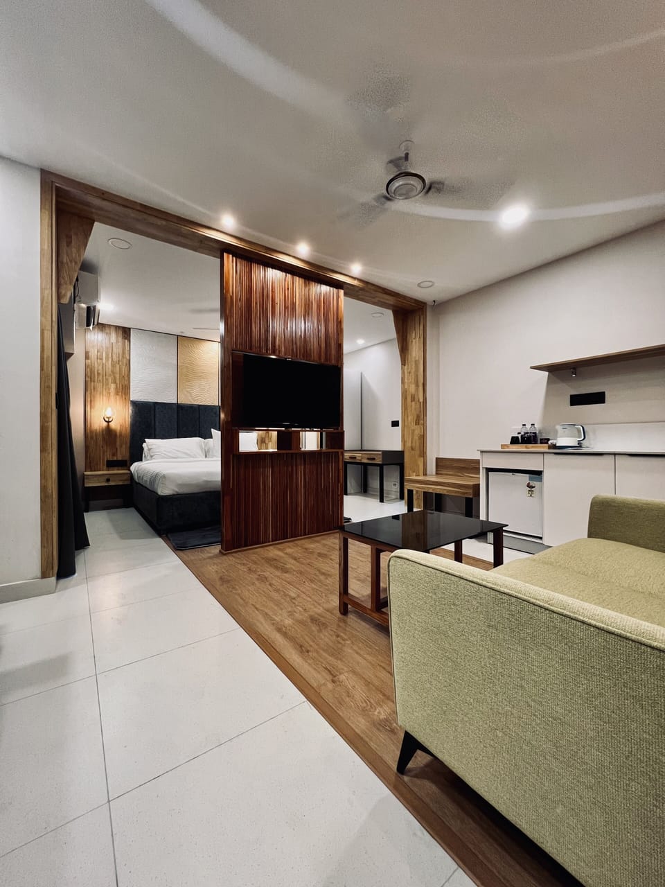 Super Deluxe Room | Living area | 32-inch LED TV with cable channels