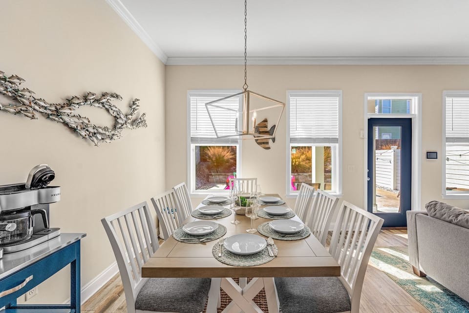 Dining room table seats 8, +4 available seats at island. Add'l stools upstairs.