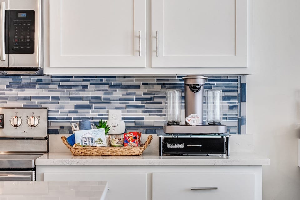 Enjoy the Bartesian automated cocktail maker and downstairs coffee bar!