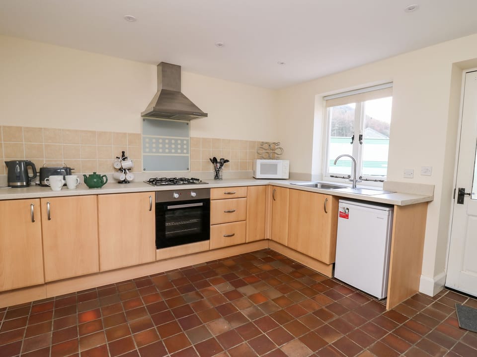 Fridge, electric kettle, toaster, cookware/dishes/utensils