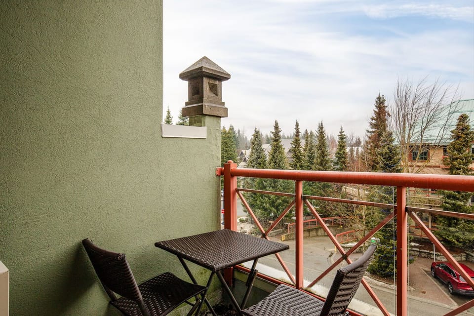 Enjoy fresh mountain air from your private balcony.
