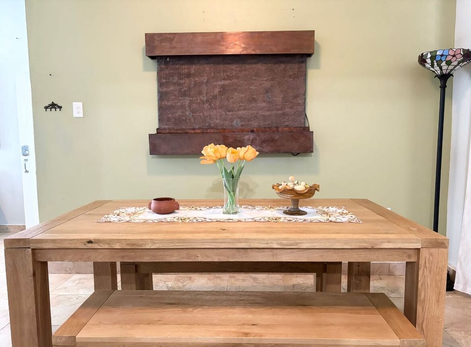 Kitchen looks into dining room. Easy to converse. 
