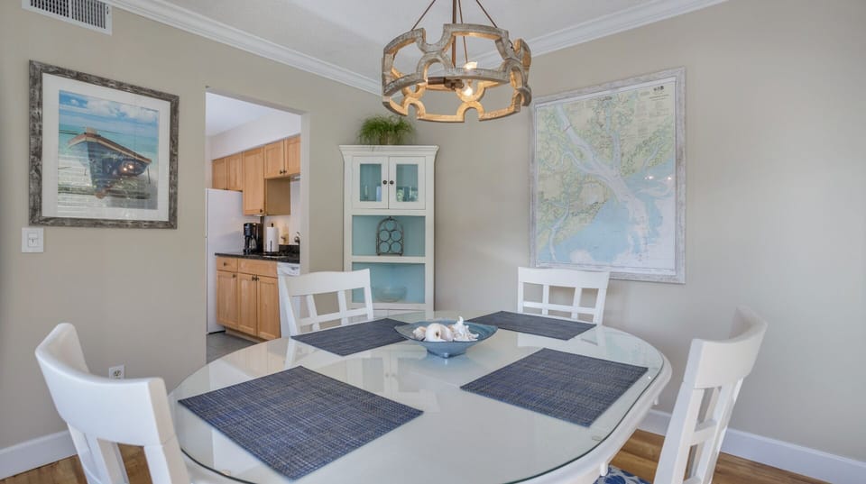 The open layout keeps everyone together, with the kitchen just steps away for easy serving and relaxed entertaining.