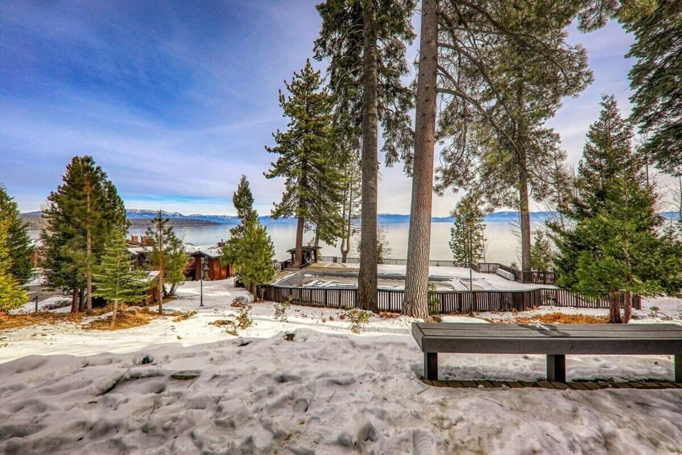 The backyard area of this cozy lakeside retreat is its best feature, with expansive Tahoe views as well as views of the mountains beyond.