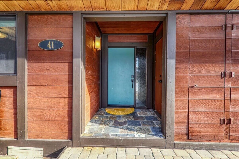 Enter the home through the front entranceway, which welcomes you to your sunny Tahoe oasis.