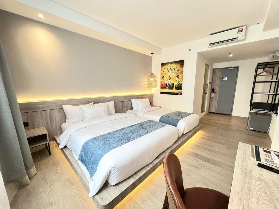 Standard Triple Room | In-room safe, desk, blackout drapes, iron/ironing board