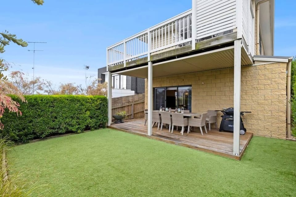 Easy indoor-outdoor flow to the decked alfresco area is perfect for outdoor dining