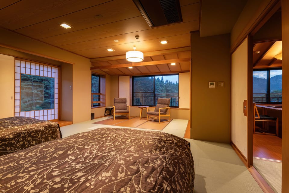 Japanese/Western-style room, Mountain view, Meals in a private dining room, Non Smoking | 1 bedroom, in-room safe, WiFi (free), bed sheets