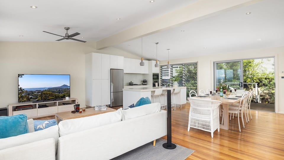 Hamptons by the Bay | Living room and kitchen | Ceiling fan  Smart TV