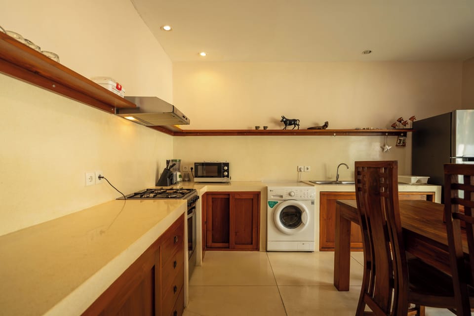 Villa | Private kitchen | Fridge, microwave, oven, stovetop