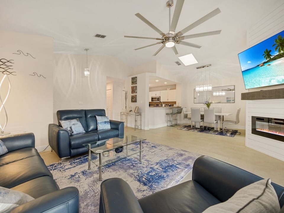 Living room area with view of kitchen and dining