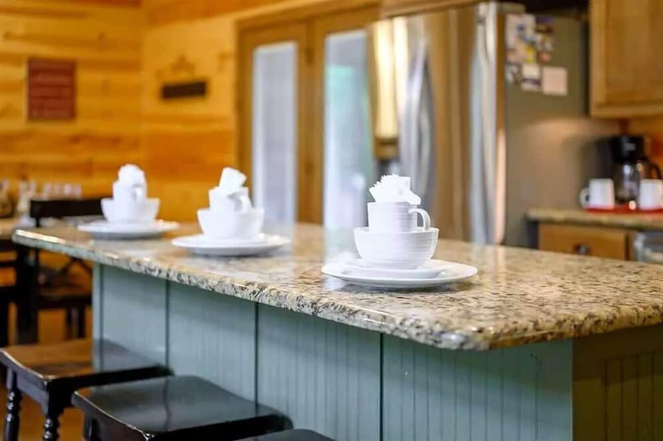 3 can sit comfortably at the large kitchen island.