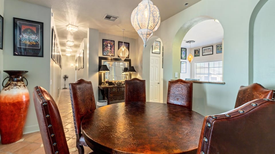 Gorgeous lighting above the beautiful dining room.