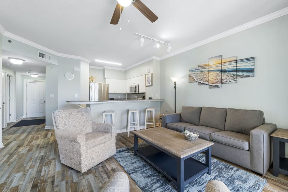 Modern living room with comfortable seating and an open kitchen layout