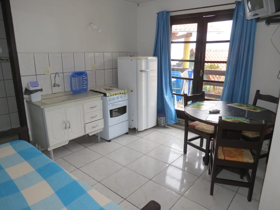 Apartment Triple, Balcony, Partial Sea View | In-room dining