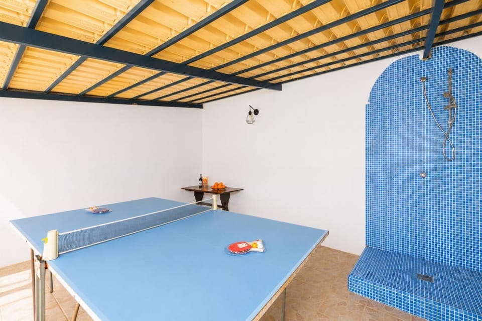 Sheltered terrace with table tennis and outdoor shower