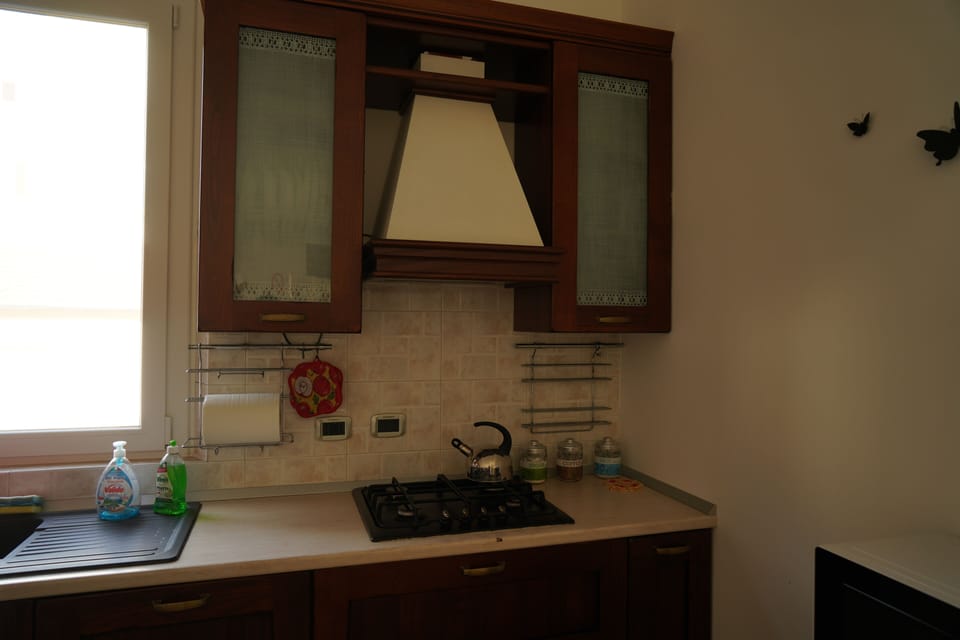 Apartment | Private kitchen | Full-size fridge, oven, cookware/dishes/utensils