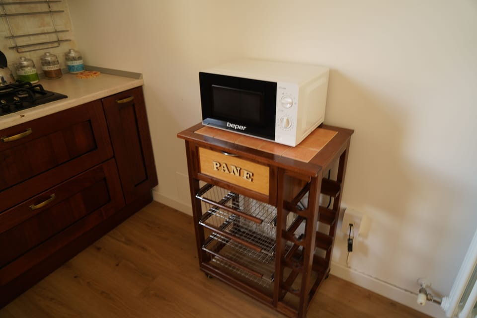 Apartment | Private kitchen | Full-size fridge, oven, cookware/dishes/utensils