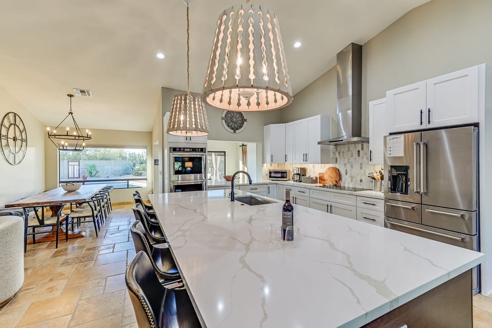 Open space, open possibilities! From dinner prep to late-night chats, our kitchen and dining area handle it all with ease.