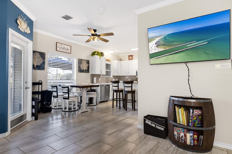 he living room provides a DVD payer with movies. Board games, puzzles, and books