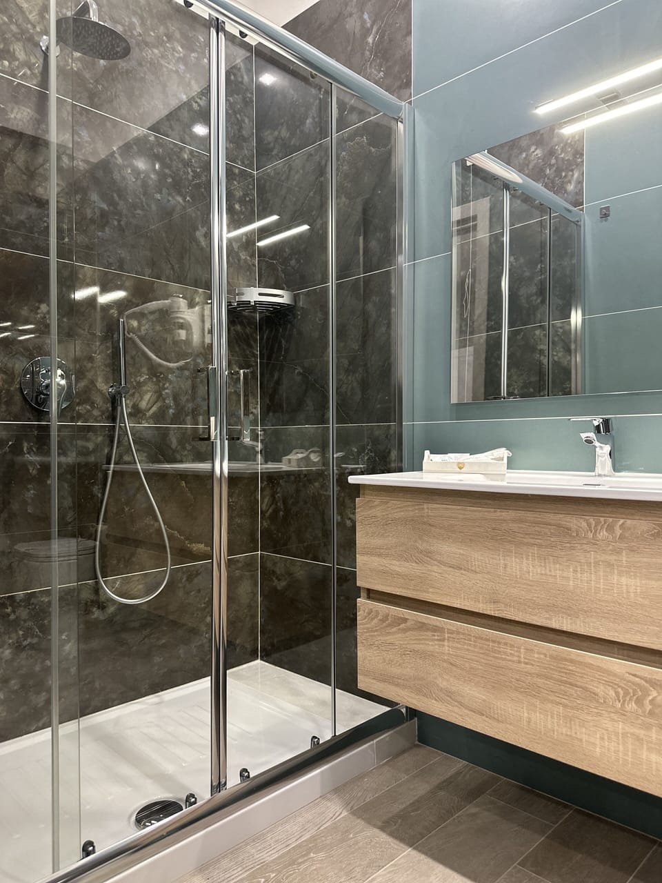 Deluxe Room (Massimo Troisi) | Bathroom | Shower, rainfall showerhead, eco-friendly toiletries, hair dryer