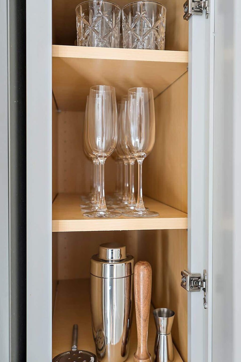 Dedicated cocktail glass cabinet for easy access