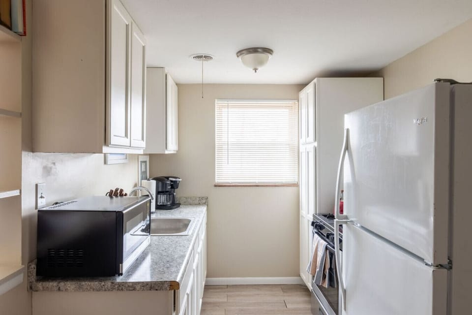 Prepare your favorite dishes in this fully equipped kitchen, furnished with all essential cooking utensils