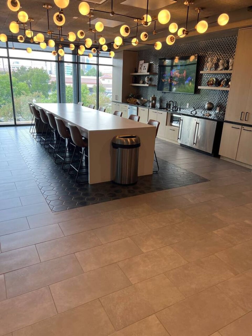 Shared Kitchenette: A Cozy Spot for Gathering, and Warming Hearts! Features sink, TV and under counter refrigerators. #CloudStays