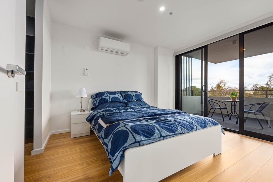 Bedroom 1 with balcony and view