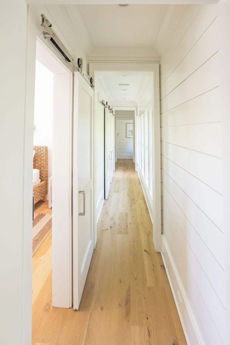 Hallway upstairs to remaining second floor bedrooms.