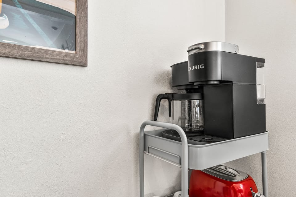 Keurig Coffee Machine. Compliantly coffee pods and sweetener. 