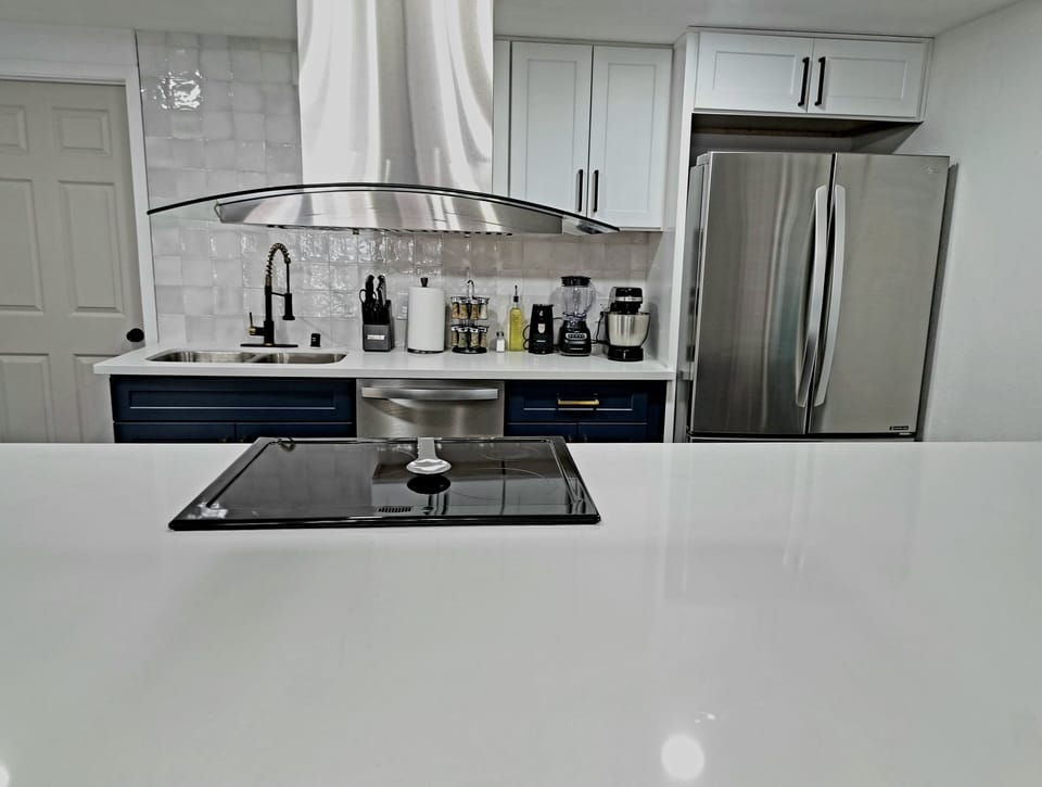 The kitchen has all the cooking supplies needed, and dishware for 12 people. 