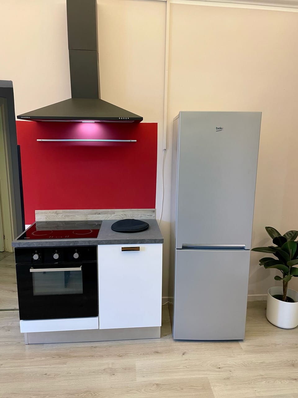 Espresso maker, coffee/tea maker, shared fridge, electric kettle