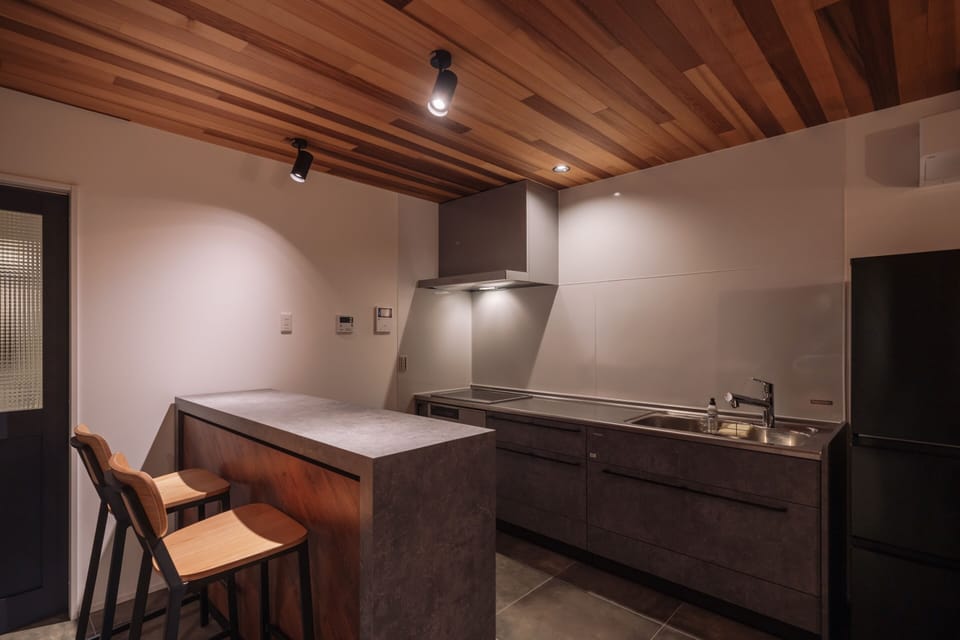 Deluxe Villa | Private kitchen | Full-size fridge, microwave, oven, stovetop