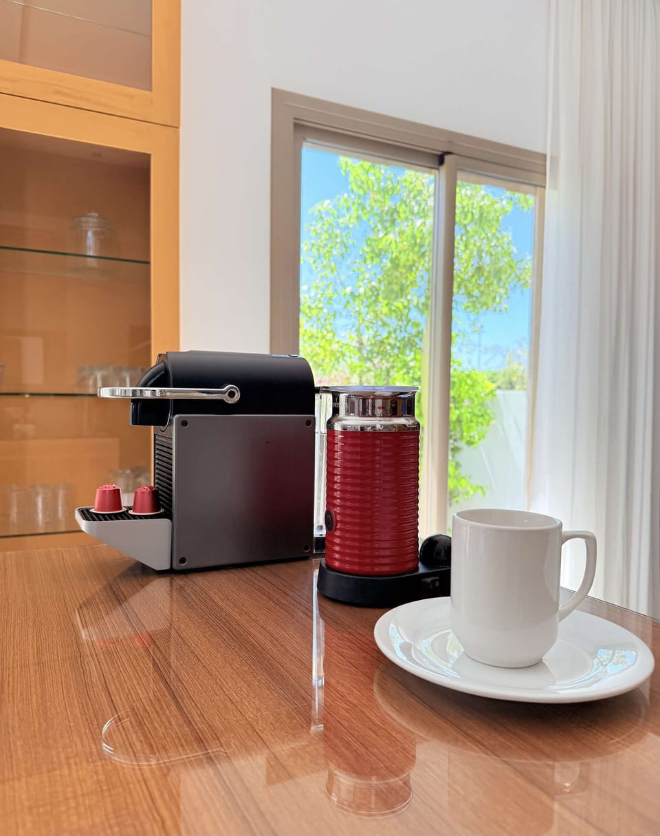 Enjoy your morning coffee with garden views.