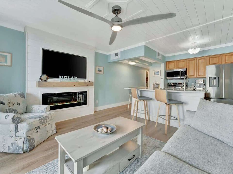 Comfortable living area flows seamlessly into a well-equipped kitchen