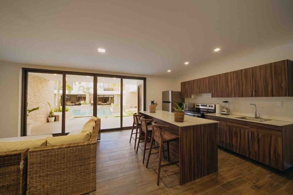 Villa | Private kitchen | Espresso maker, coffee/tea maker, full-size fridge, microwave