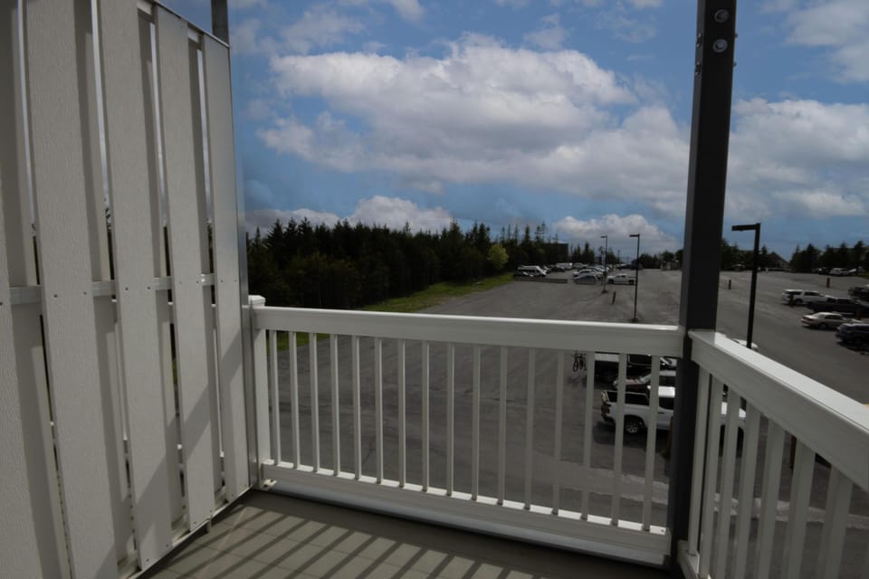 Sunny balcony with peaceful views and fresh air breeze