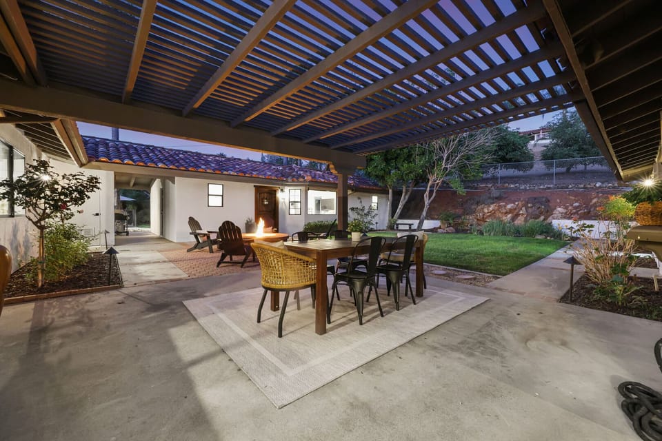 Peaceful courtyard with fire pit and BBQ grill. Please note: the main house is NOT part of your rental.