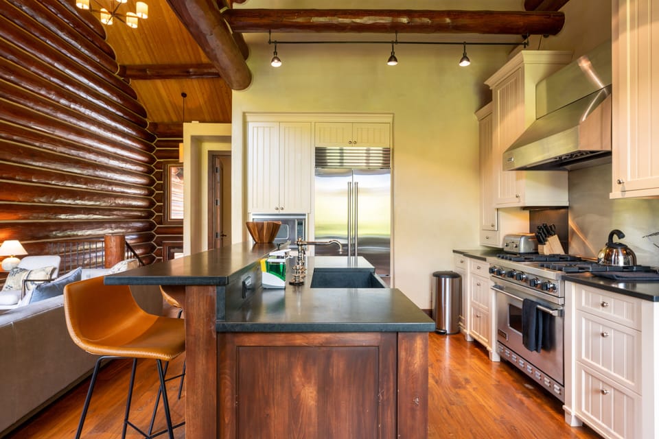 Barstool seating at the kitchen island.