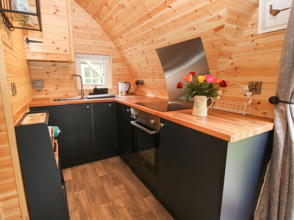 Fridge, electric kettle, cookware/dishes/utensils