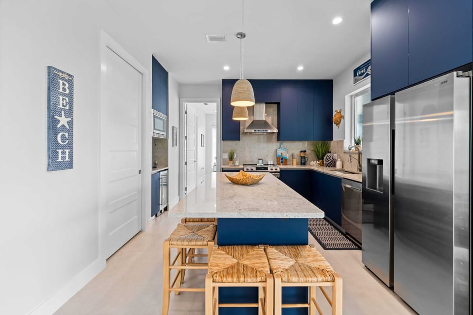 Watch the designated chef in action while enjoying a few drinks at the kitchen island.
