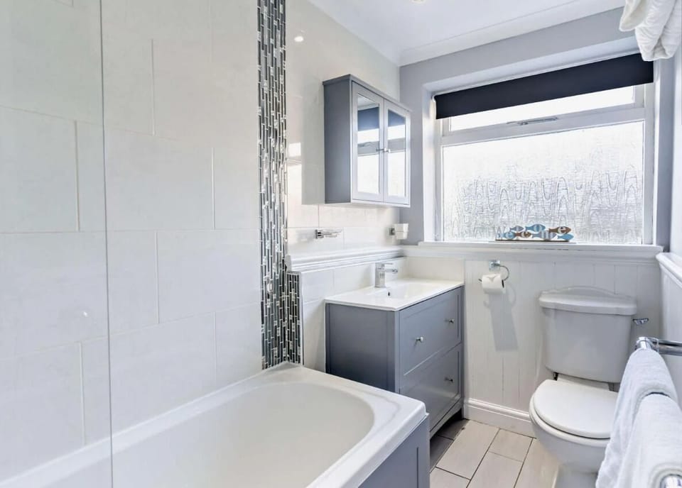 Fresh towels, a shower over bath and everything you need to start or end the day comfortably.
