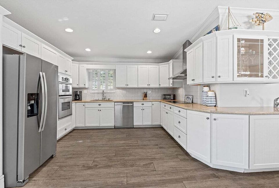 Designed for entertaining with generous workspace, modern appliances, and easy flow into the living areas.
