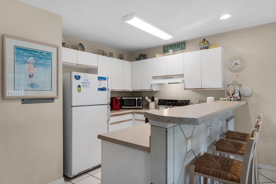 Kitchen with eat-in bar seating