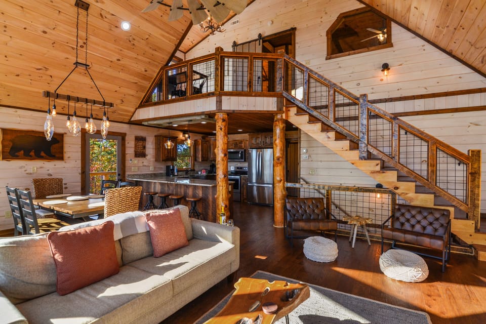 Living room leading into dining area into Kitchen